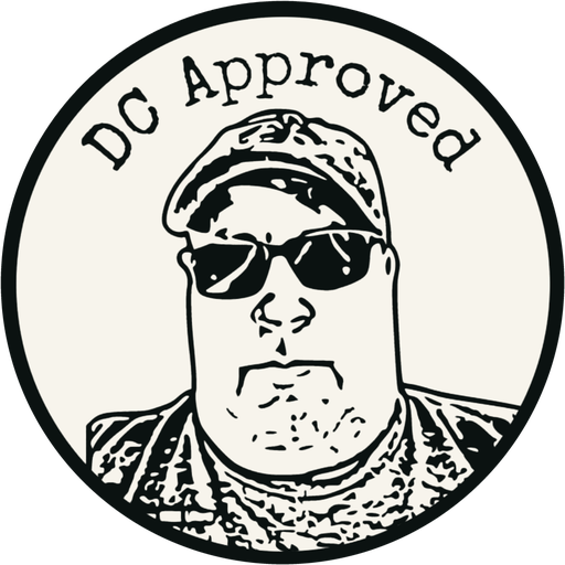 Darin Chamberlin's personal DC Approved sticker: a hand-drawn caricature of him in a cap and sunglasses inside a circular seal reading DC Approved.